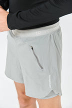 Pantaloneta running 5" - Gris